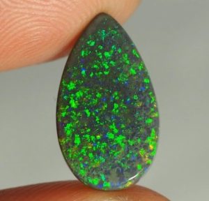 Discover the Captivating Beauty and Value of Black Opal Stone
