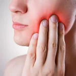 Why Does My Gum Hurt in One Spot? Reasons & Fixes 2026