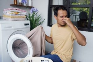 Why Does My Washer Smell Like Rotten Eggs? Causes & Fixes 2026