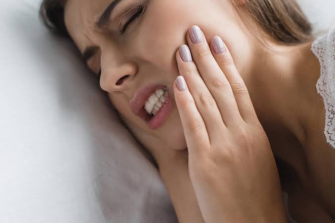 Why Does My Tooth Hurt When I Lay Down? Real Causes and Fast Relief 2026