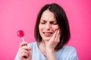 Why Does My Tooth Hurt When I Eat Sweets? What It Means 2026