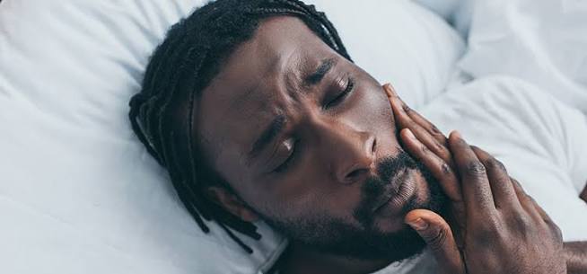 Why Does My Tooth Hurt When I Lay Down? Real Causes and Fast Relief 2026