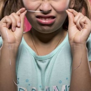 Why Does My Floss Smell Like Poop? Causes & Fixes 2026