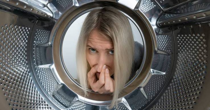 Why Does My Washer Smell Like Rotten Eggs? Causes & Fixes 2026